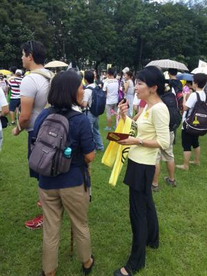 Claudia Mo, legislator, before the &quot;The Citizens Against Pseudo-Universal Suffrage&quot; march, Hong Kong, June 14, 2015. HRIC photo.