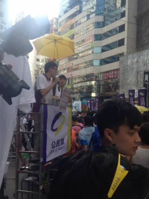 Members of the Civic Party, including Claudia Mo, address the crowd during the democracy march organized by Civil Human Rights Front, Hong Kong, July 1, 2015. HRIC photo.