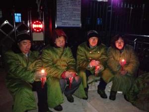 Lawyers and activists gather outside Qixing Detention Center in Jiangsanjiang, Heilongjiang, to protest unlawful detention of rights defense lawyers and citizens, March 25, 2014.